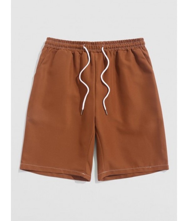 Men's Casual Minimalist Style Japanese Graphic Printed Short Sleeves T-shirt With Solid Color Basic Shorts Set